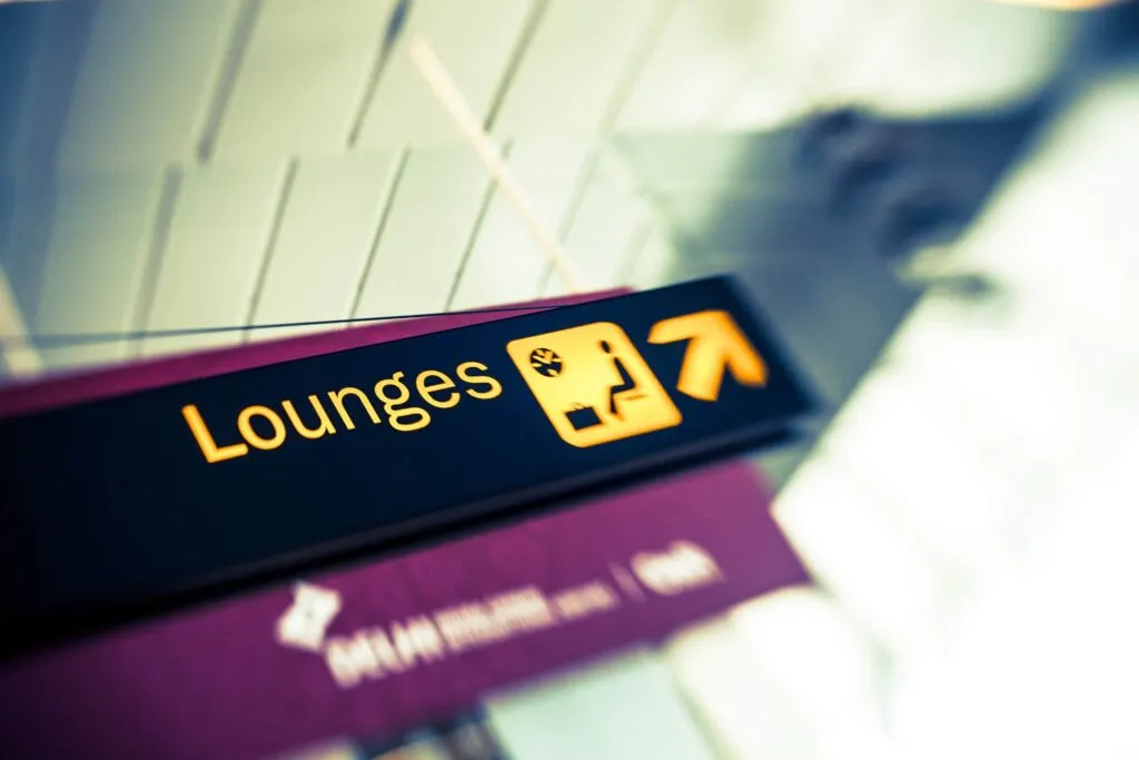 A sign in an airport for the airport lounges