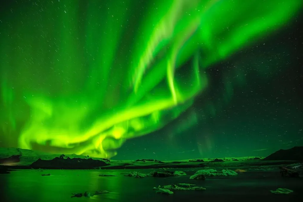 Aurora borealis. Photo by Paul Morris on Unsplash