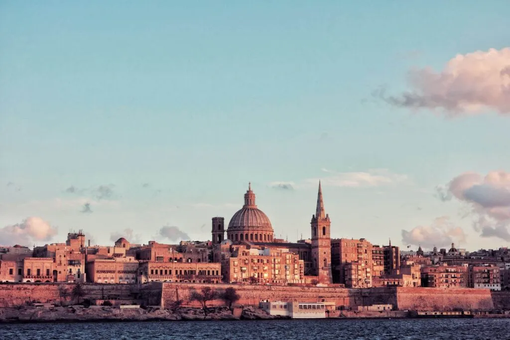 Valletta skyline at sunset. Photo by Micaela Parente on Unsplash